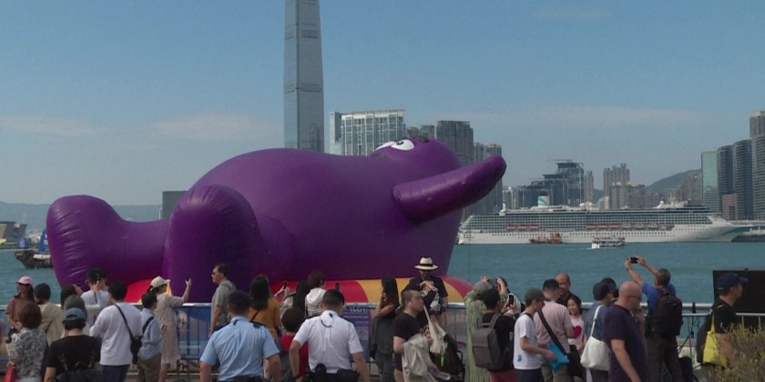 Giant inflatable Labubu, Elmo float on Hong Kong's Victoria Harbour ...