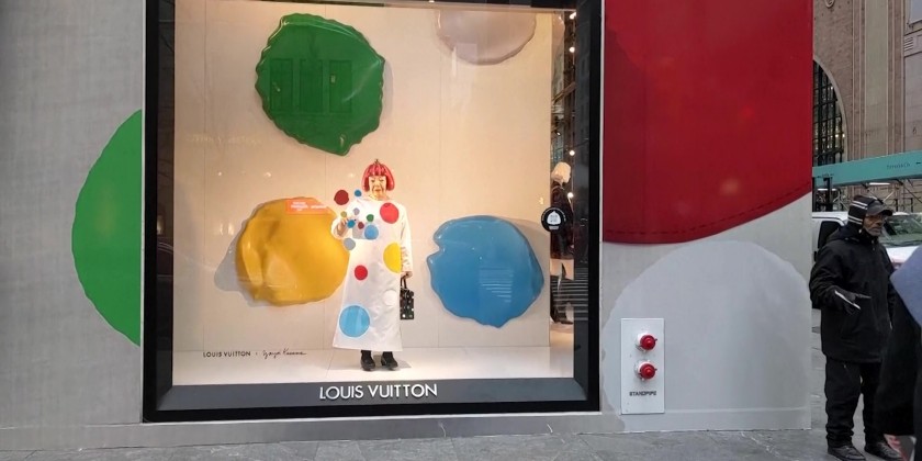 Robot of artist Yayoi Kusama in window of NY Louis Vuitton store